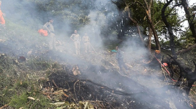 Wreckage of helicopter crash in Uttarakhand mountains as rescue operation takes place